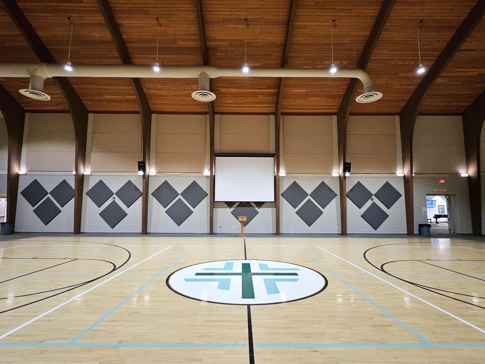 Gymnasium acoustic panel installation, alternate angle