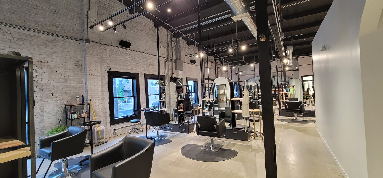Home salon space with integrated audio system installed by Noble A-V