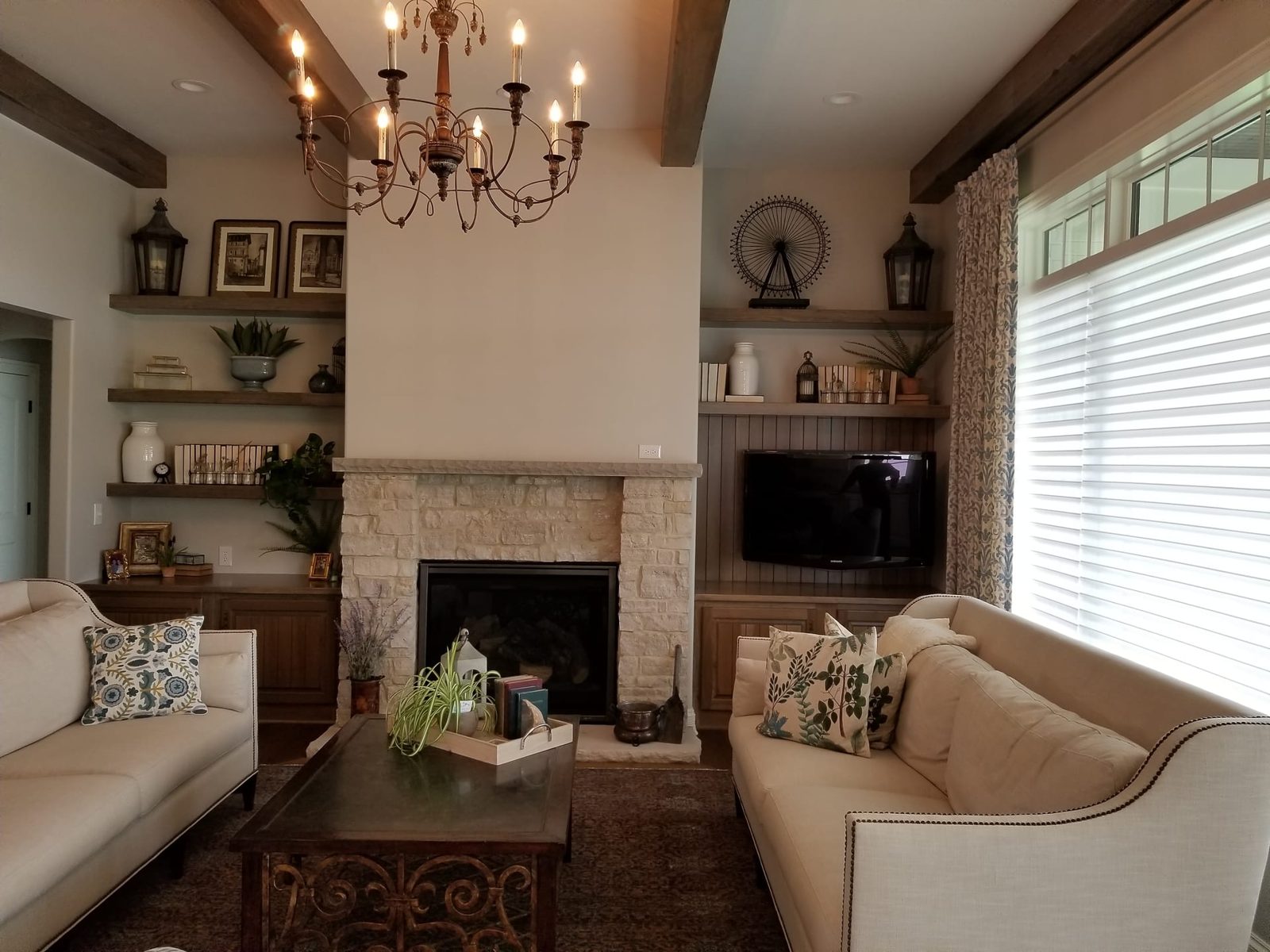 Luxury living room with concealed in-ceiling speakers and discreet smart-home AV integration by Noble A-V