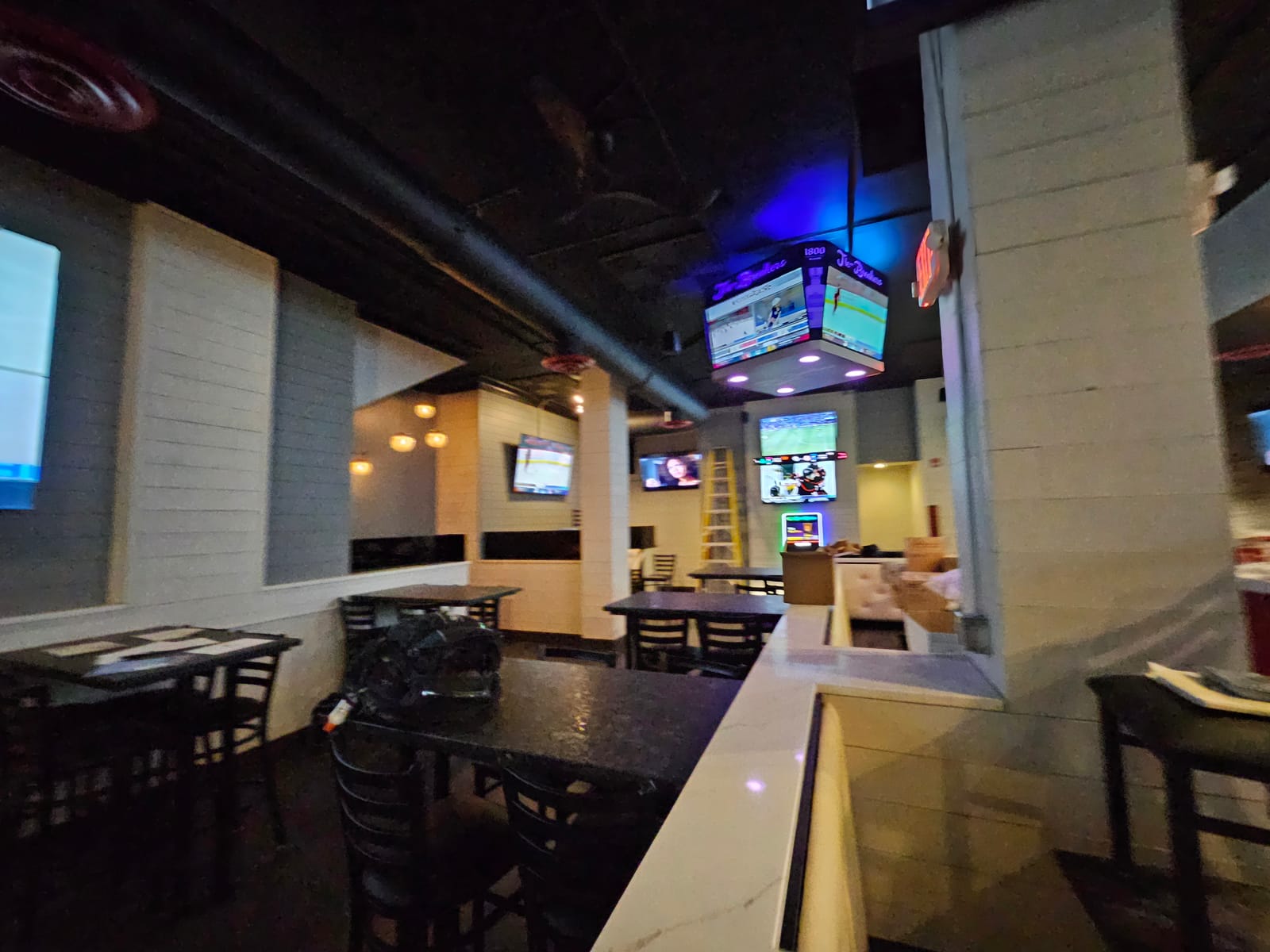 Tie Breakers dining area with multi-zone display layout