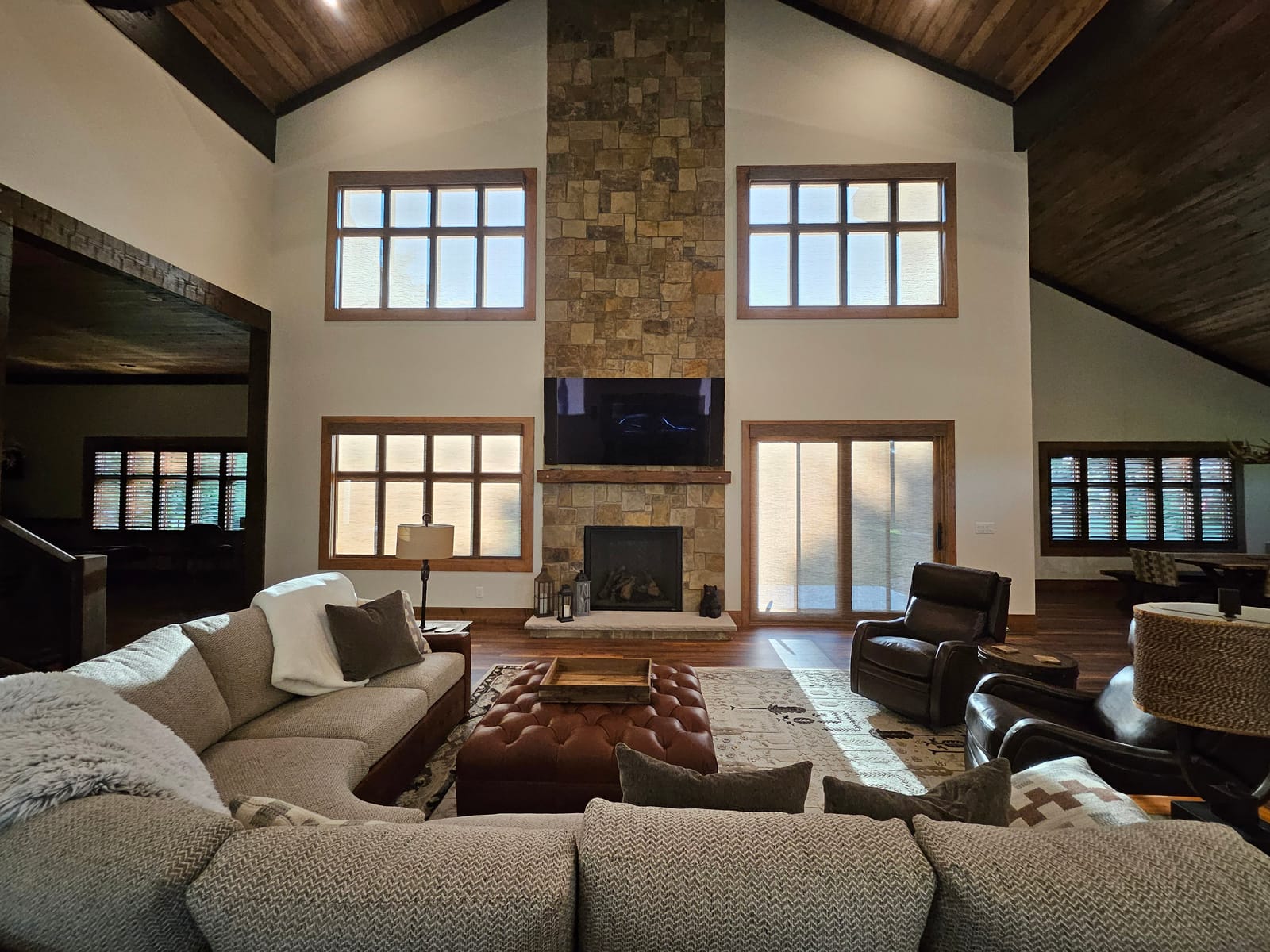 Television over fireplace with integrated in-wall side speakers for stereo imaging