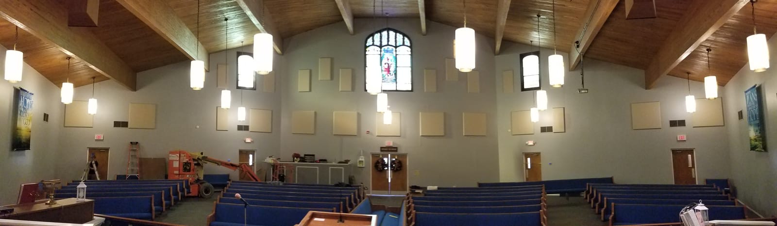 Sanctuary side wall with custom acoustic absorber panels installed for speech intelligibility