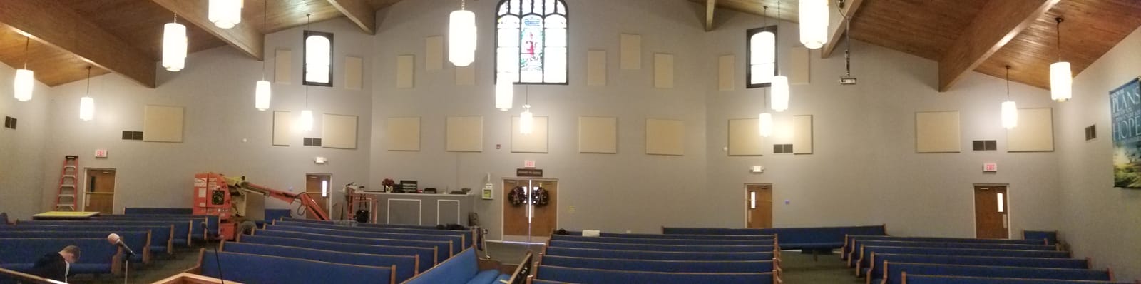 Wide-angle view of full sanctuary acoustic panel installation